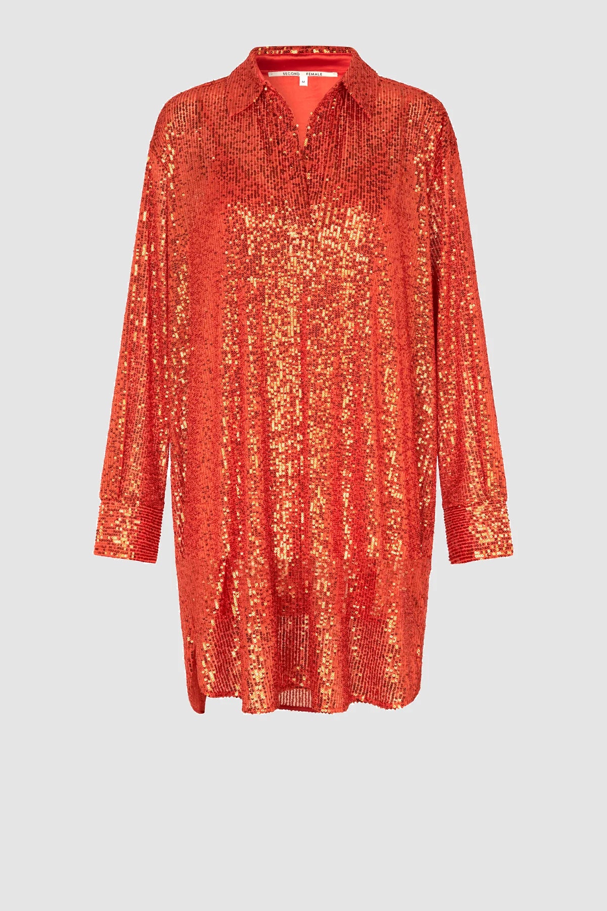 Burnt orange sequin tunic with long sleeves half placket classic collar and dropped curved hem