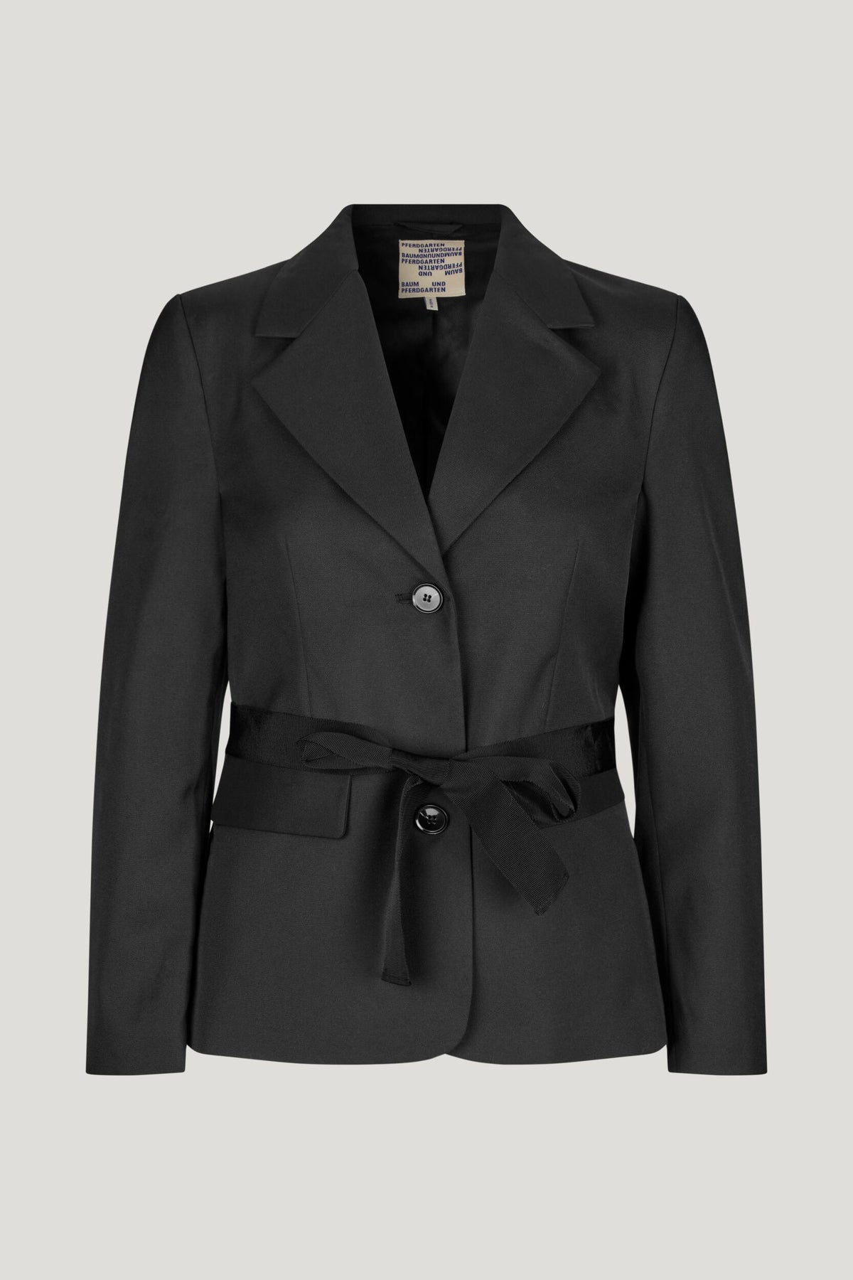 Classic black blazer with single breasted plastic button fastenings fabric tie  belt and  long side vents