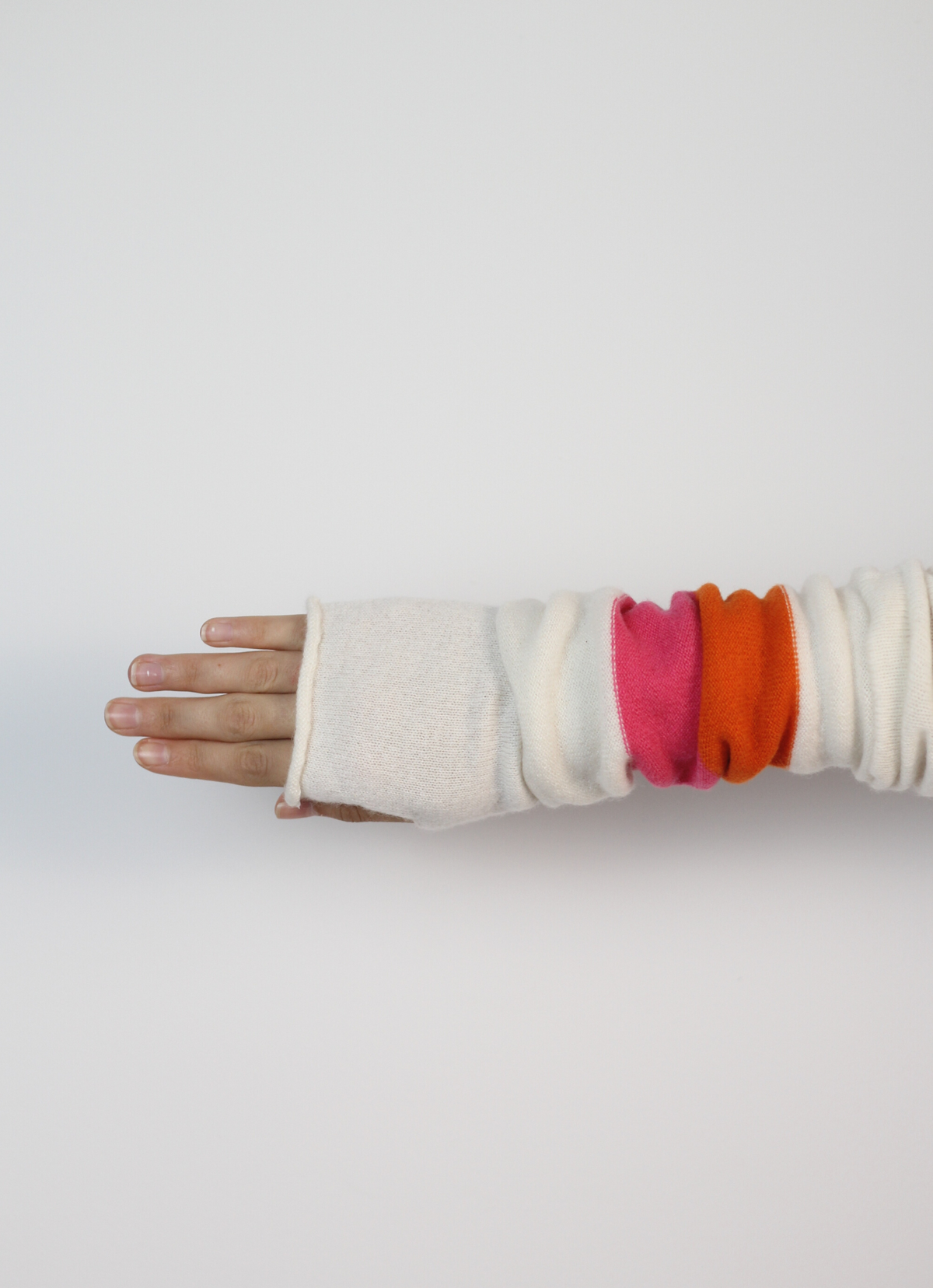 block colour wrist warmer with Orange, pink and white 