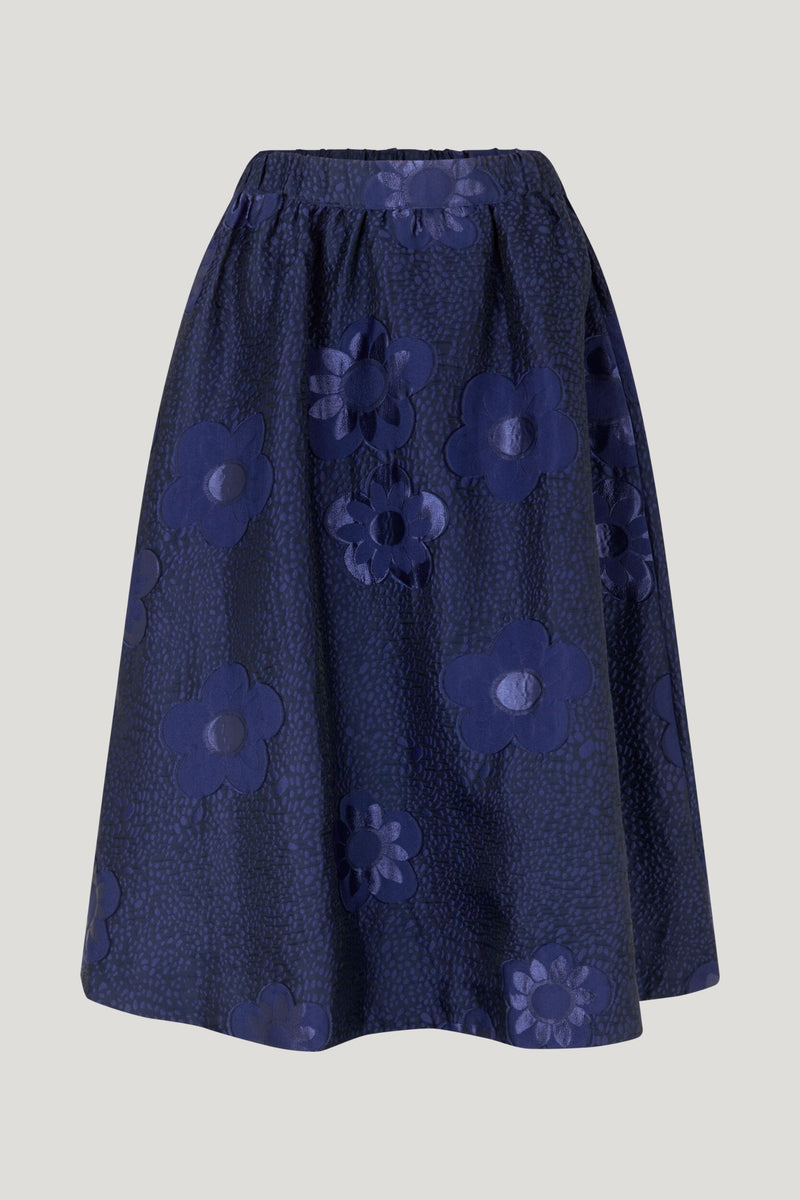 Midi full skirt with elasticated waistband at rear and embroidered flower design throughout