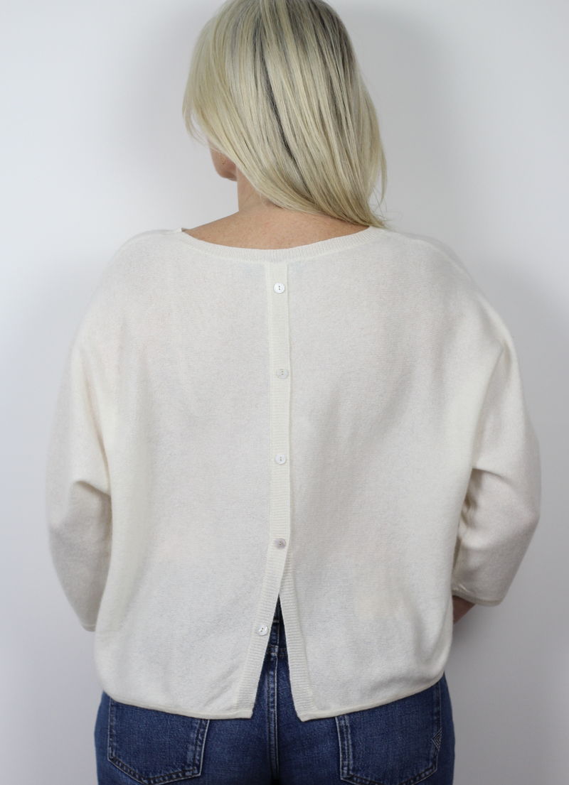 button back white knit Winter white boxy fit jumper with three quarter length sleeves and five mother of pearl buttons at the back