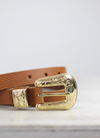 The Rosette Belt from Spanish brand Mercules is western inspired style with a gorgeous gold coloured buckle and pointer.  This narrow style looks great worn on a higher waisted trouser and also layers over dresses and knit brilliantly.