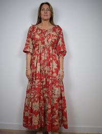 Scopp neck red maxi dress with taupe floral print shirt dress with triple layered skirt and elbow length raglan