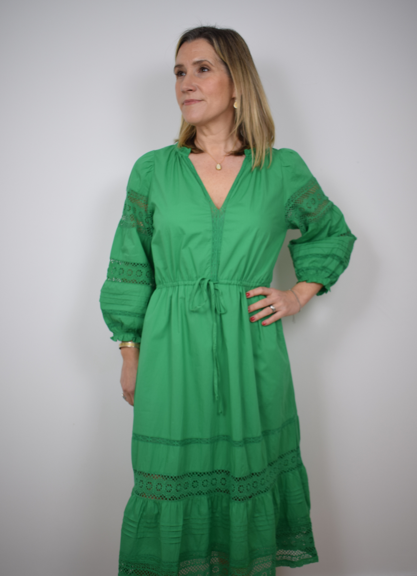 Green dress with draw string belt and lace deatil