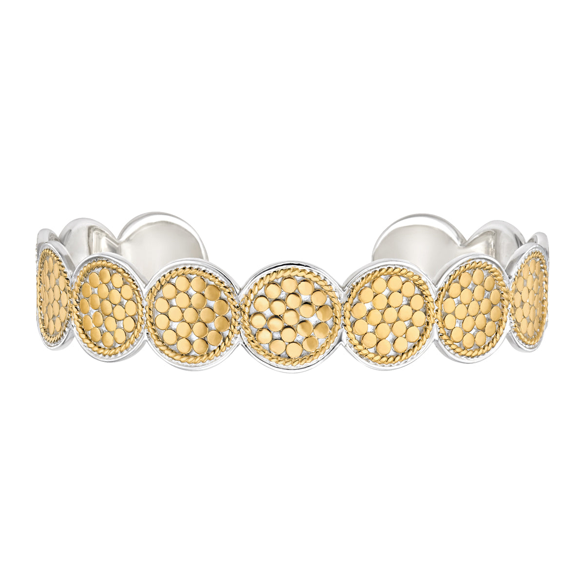Multi disc silver cuff bracelet with small gold dot decoration