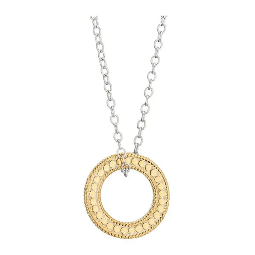 Anna Beck Circle of life necklace with silver chain and open gold pendant