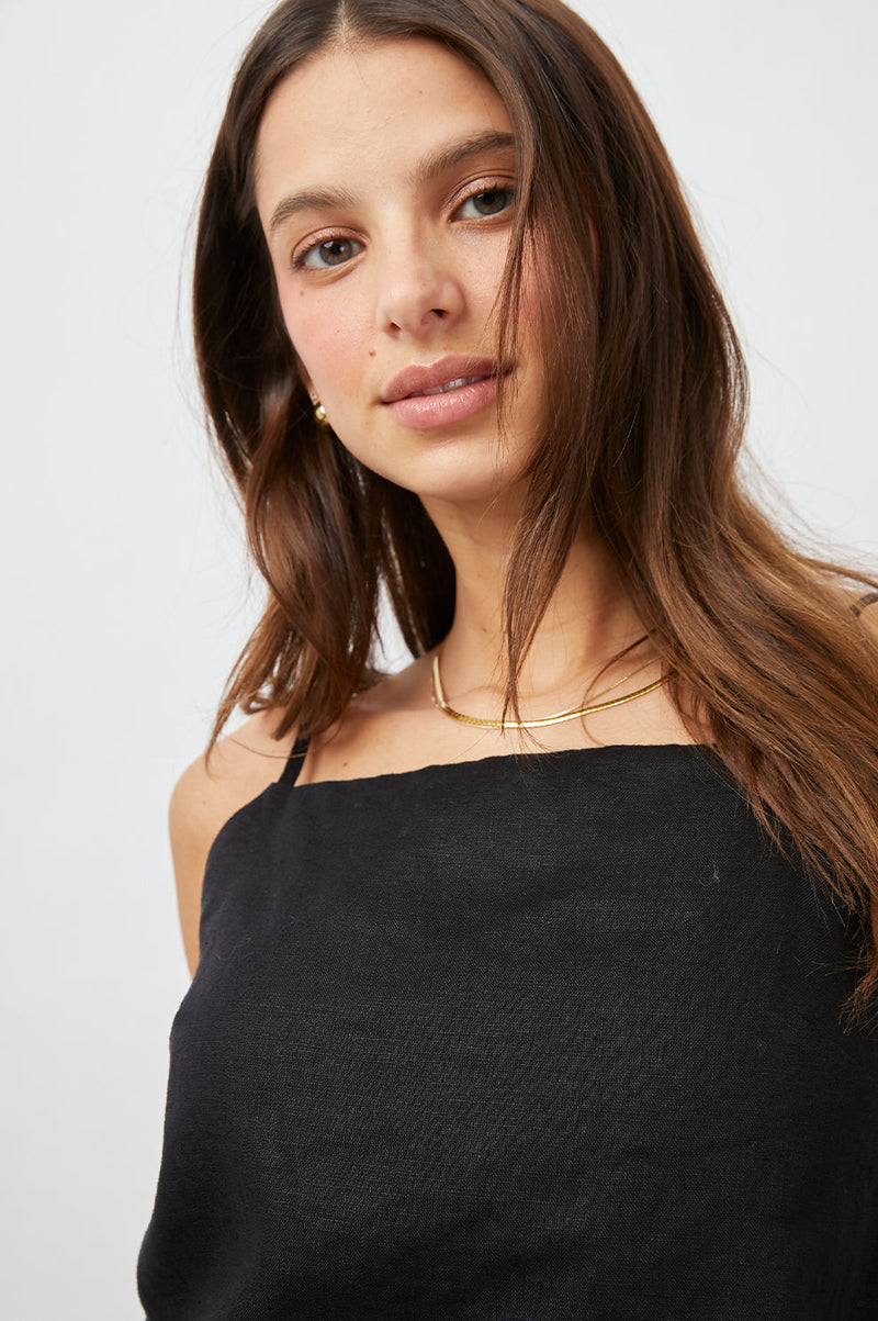 black shirt with strappy back detail