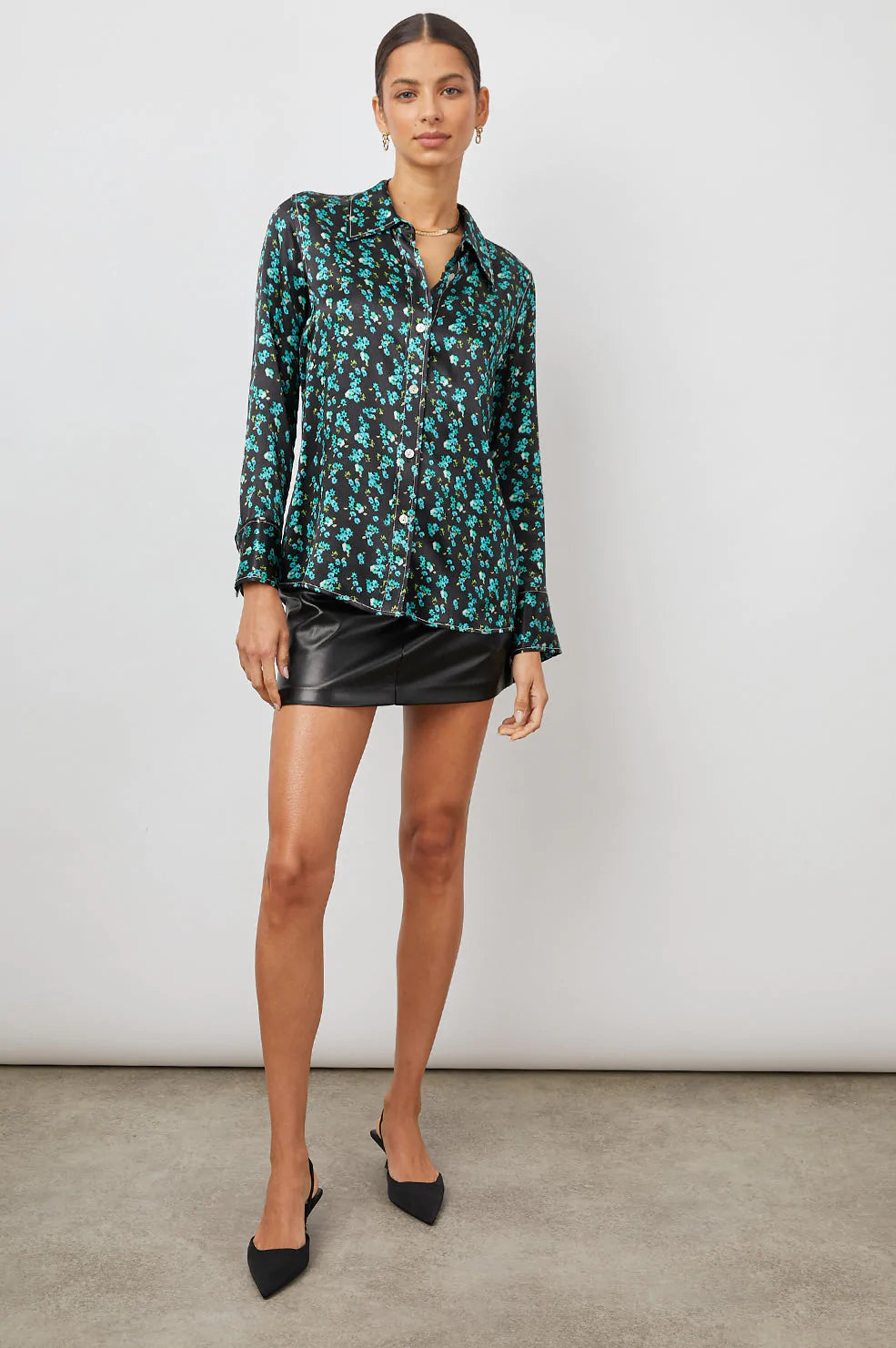 Green floral shirt with black background 