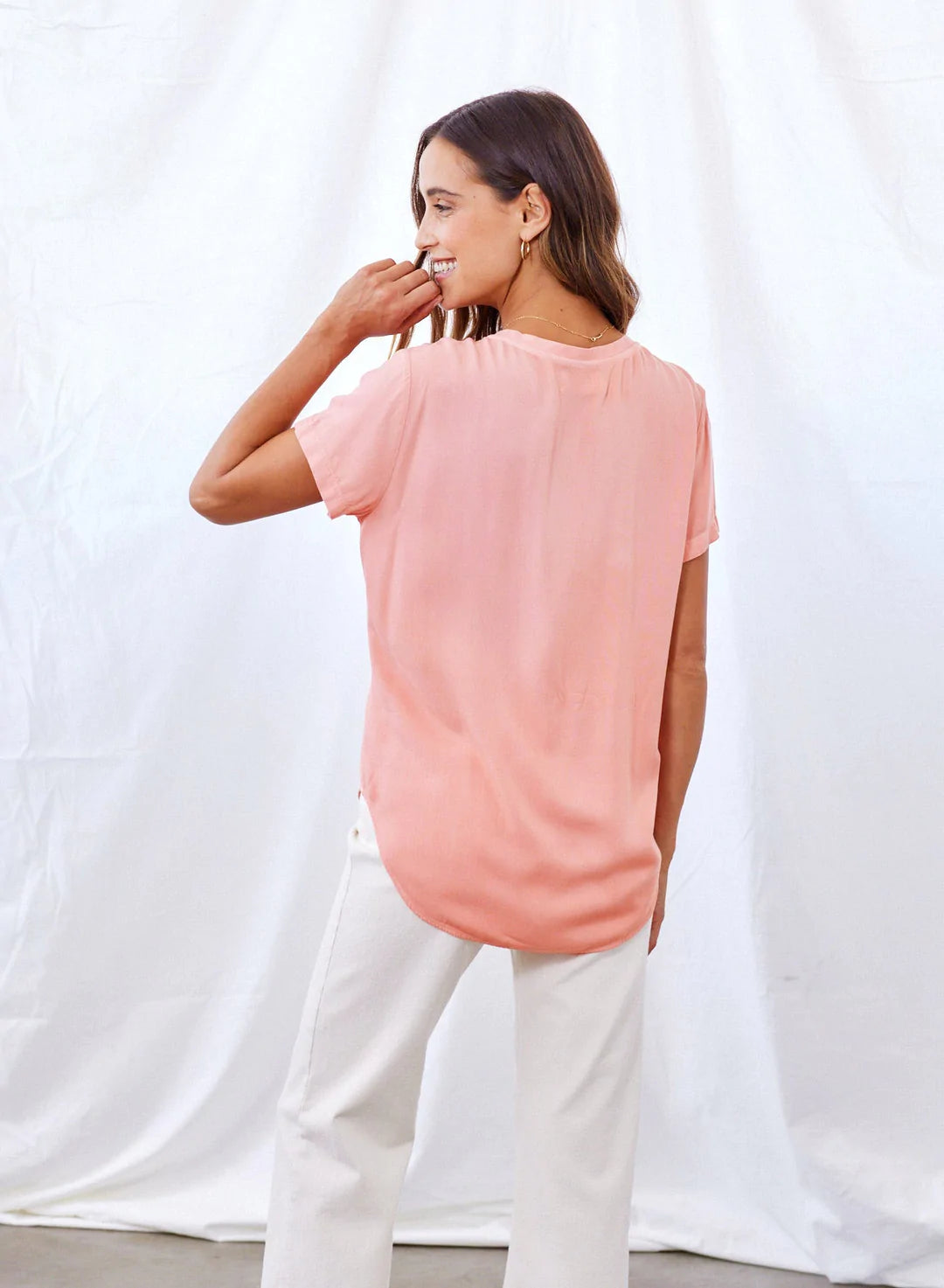 Classic light coral V neck short sleeved t shirt with curved hem longer at back than front