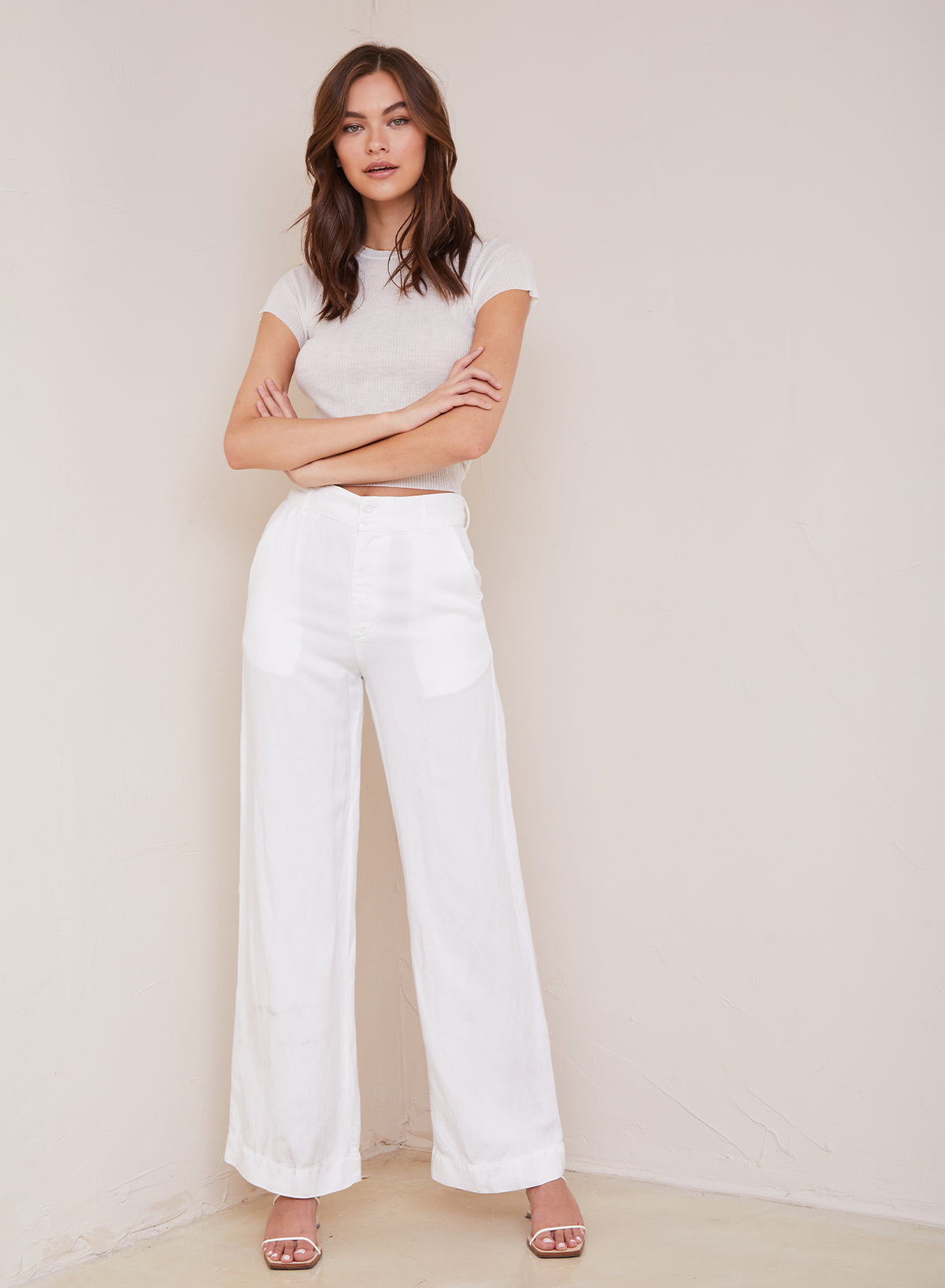 White wide leg trouser with zip fly and button fastening with slant side pockets and rear patch pockets