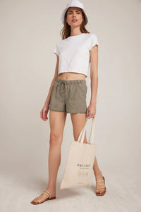 Soft kahki frayed hem summer shorts with slant front pockets and back patch pockets 