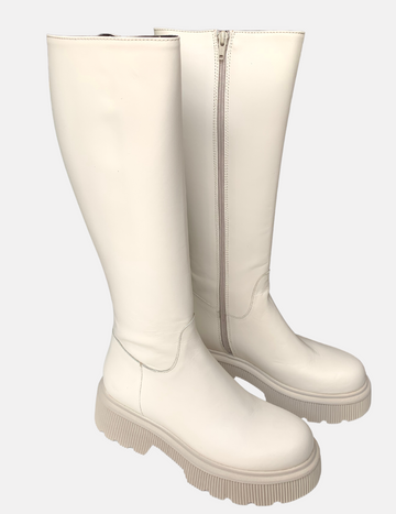 White knee high boots with zip up the side