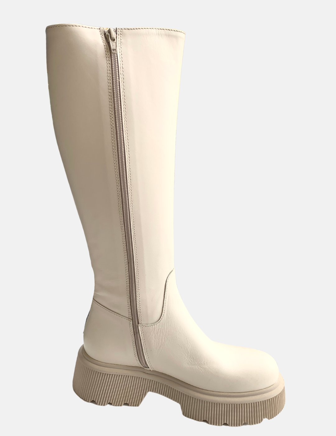 White knee high boots with zip up the side