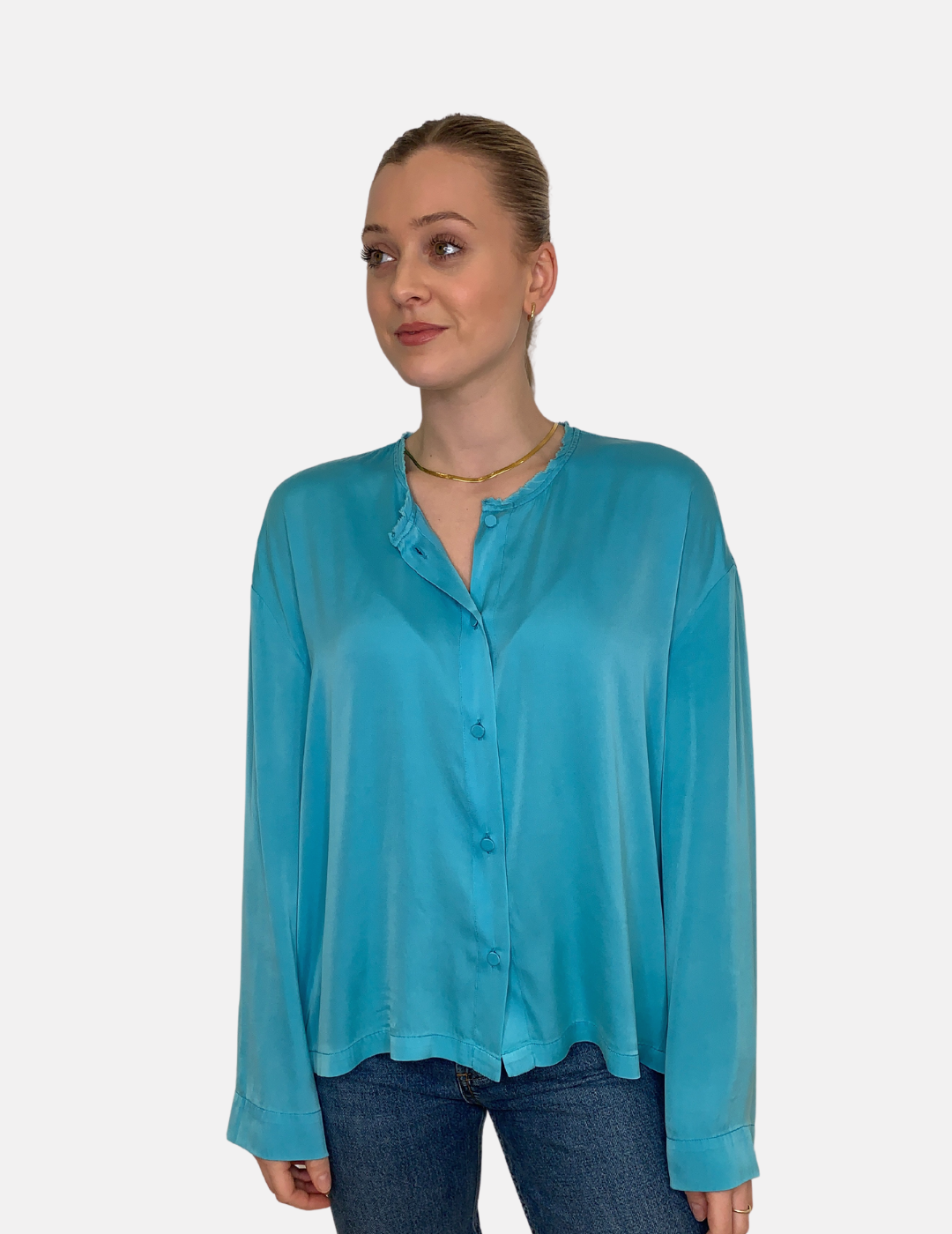 Turquoise stretch silk blouse that buttons through with a raw collar