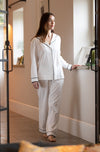 White classic cut pyjamas with black trim