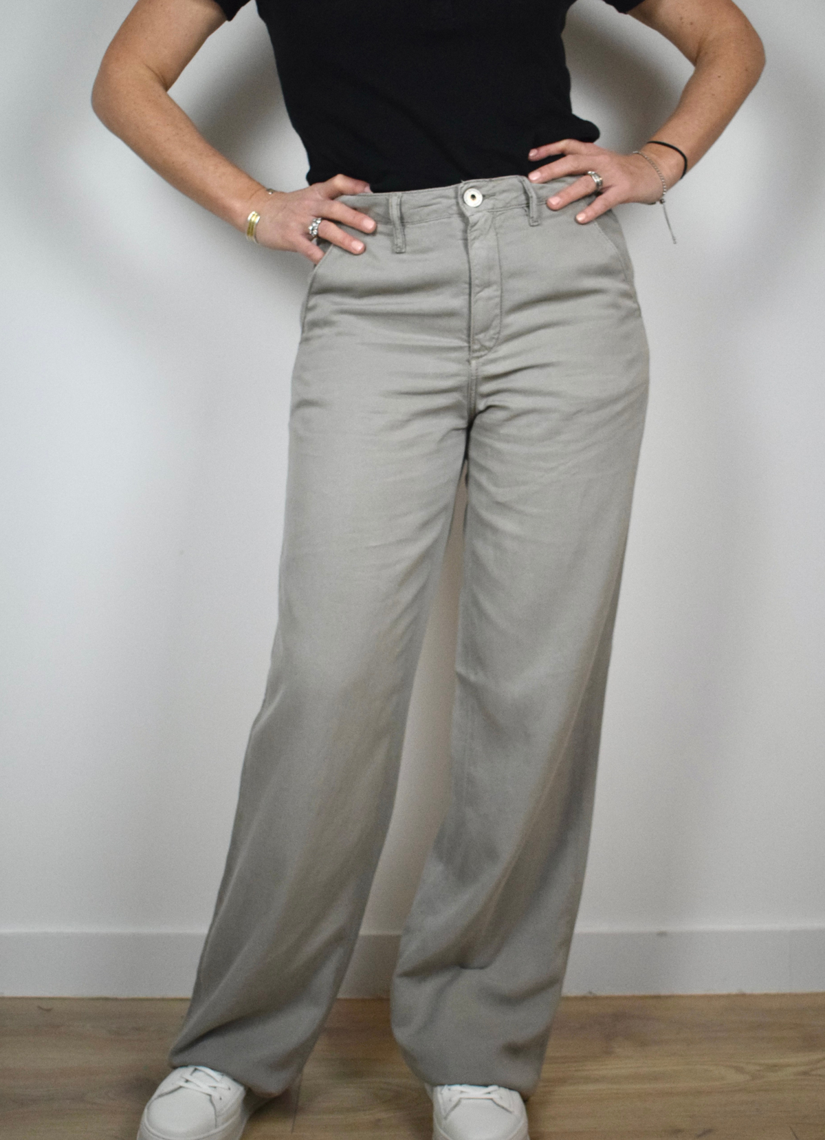 Wide leg grey trousers with mid to high rise