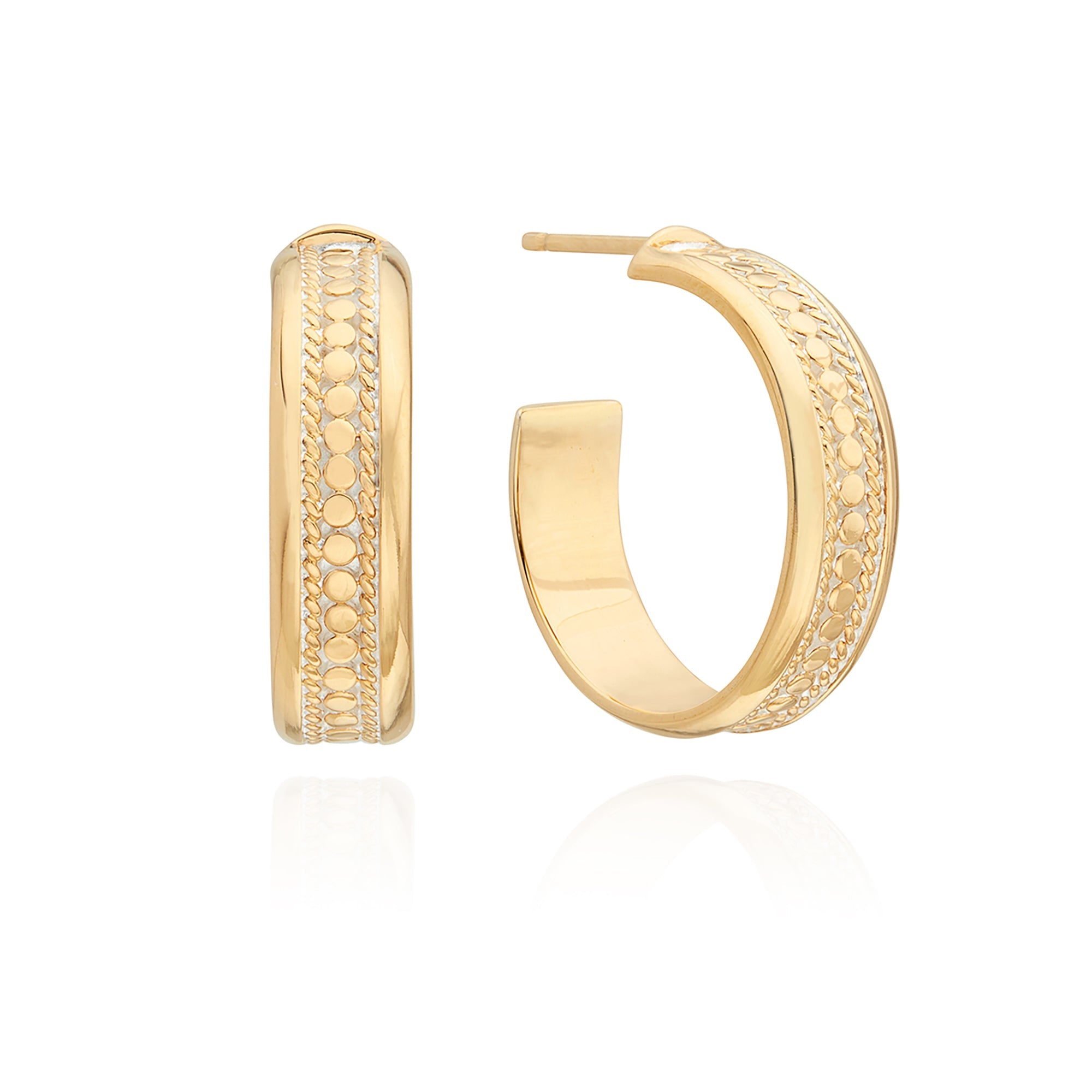 Gold hoops with smooth rims and dotted detailing