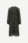 Black chiffon midi dress with tie neck and white and yellow ditsy floral print long sleeves and tie neck