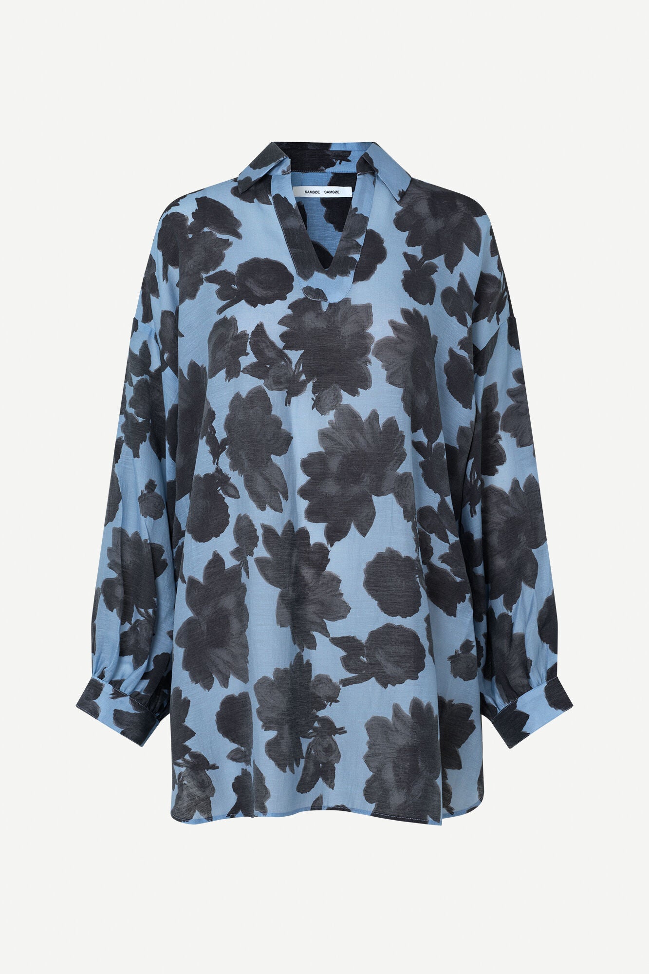 Over size tencel blend blouse in pale blue with a dark grey floral print