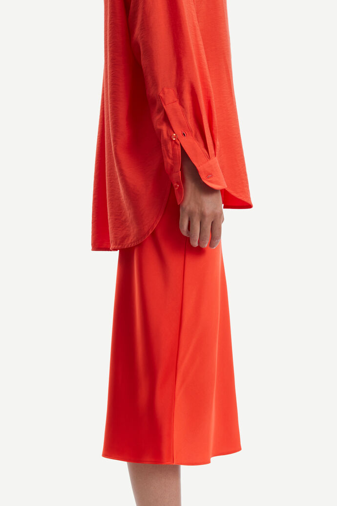 Bright orange sating midi skirt