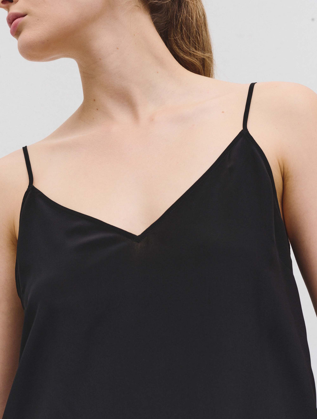 Silk black camisole with V neck and adjustable thin straps