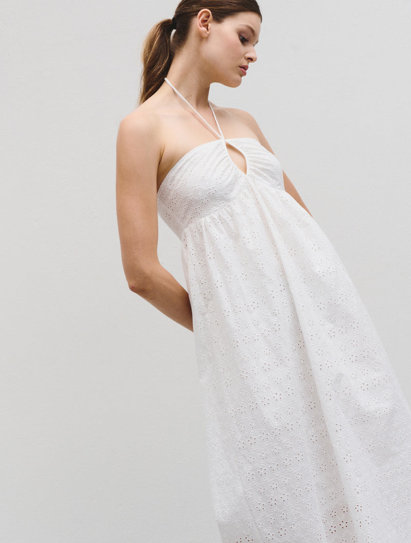 Midi length strapless top with kephole feature at chest spaghetti halterneck tie straps and broderie anglaise and embroidery details throughout in ecru