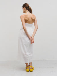 Midi length strapless top with kephole feature at chest spaghetti halterneck tie straps and broderie anglaise and embroidery details throughout in ecru