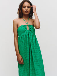 Midi length strapless top with keyhole feature at chest spaghetti halter-neck tie straps and broderie anglaise and embroidery details throughout in green
