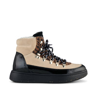 Lace up wool lined hiking style boot with animal print details and patent heel detail.