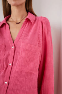 Watermelon pink cheese-cloth shirt with classic collar, mother of pearl buttons two breast patch pockets long sleeves and single button fastening