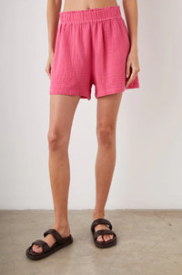 Pink cheese-cloth style cotton shorts with elasticated waistband and slant side pockets