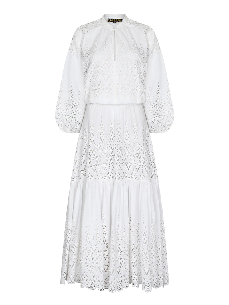 White maxi dress with broderie anglais and long puff sleeves with a shirred waist