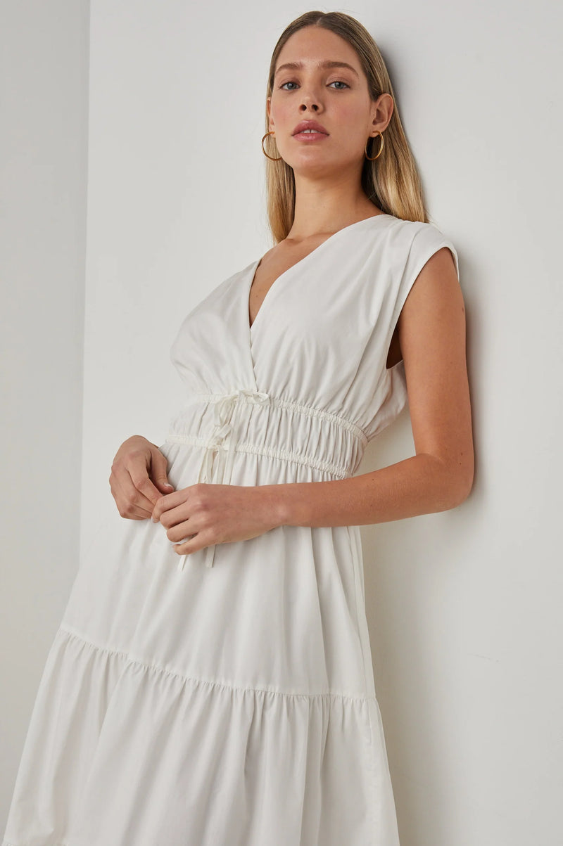 V neck wide strap dress with three tiers and elasticated and self tie fabric tie