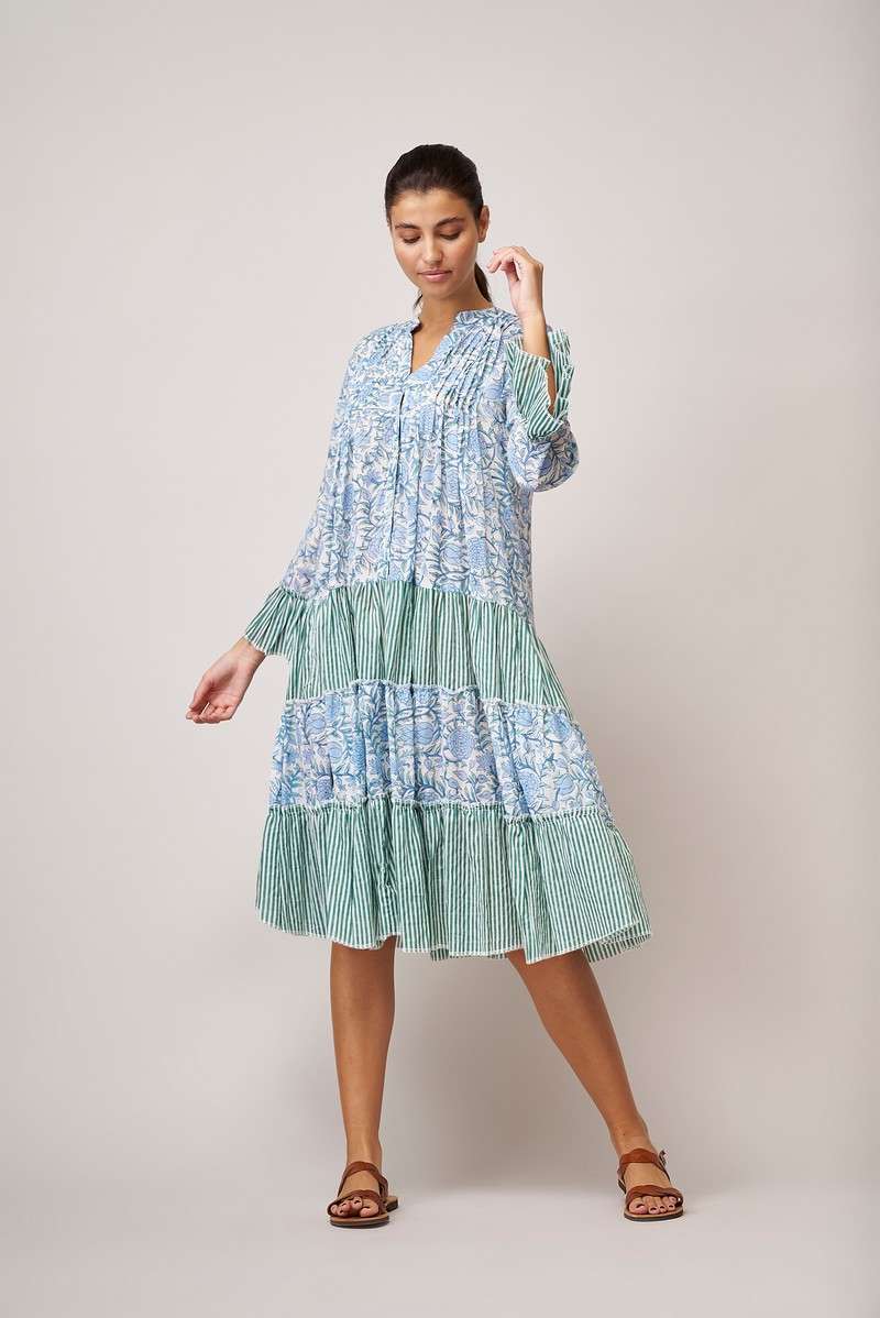 Knee length triple layered summer dress with long sleeves and ruffle cuffs, notch neck and half placket with button fastenings in contrasting fabrics