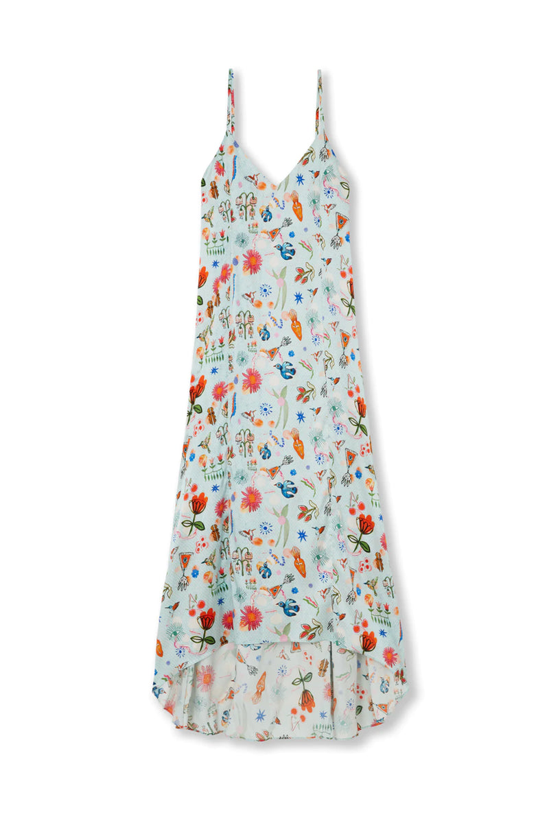 Maxi slip dress in light blue with doddle virbant coloured print and adjustable spaghetti straps with dipped hem