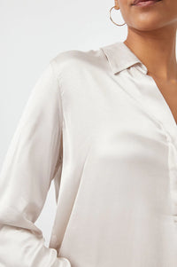 Ivory satin shirt with shaped hem