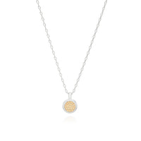 Reversible circular pendant necklace in sterling silver and gold