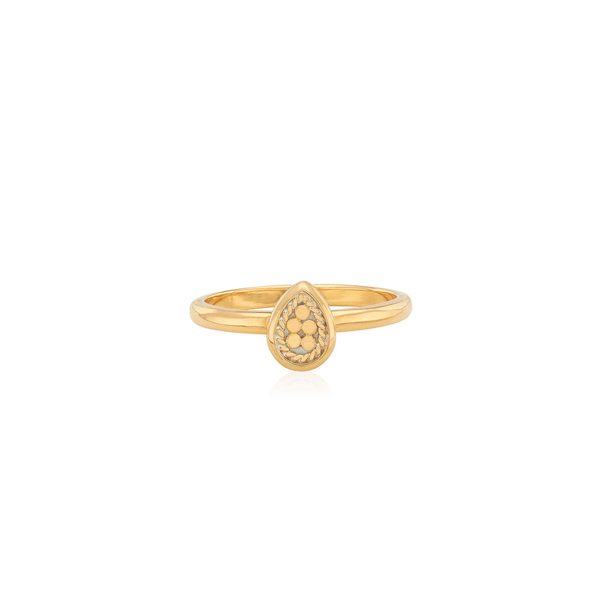 gold ring with a teardrop shaped top