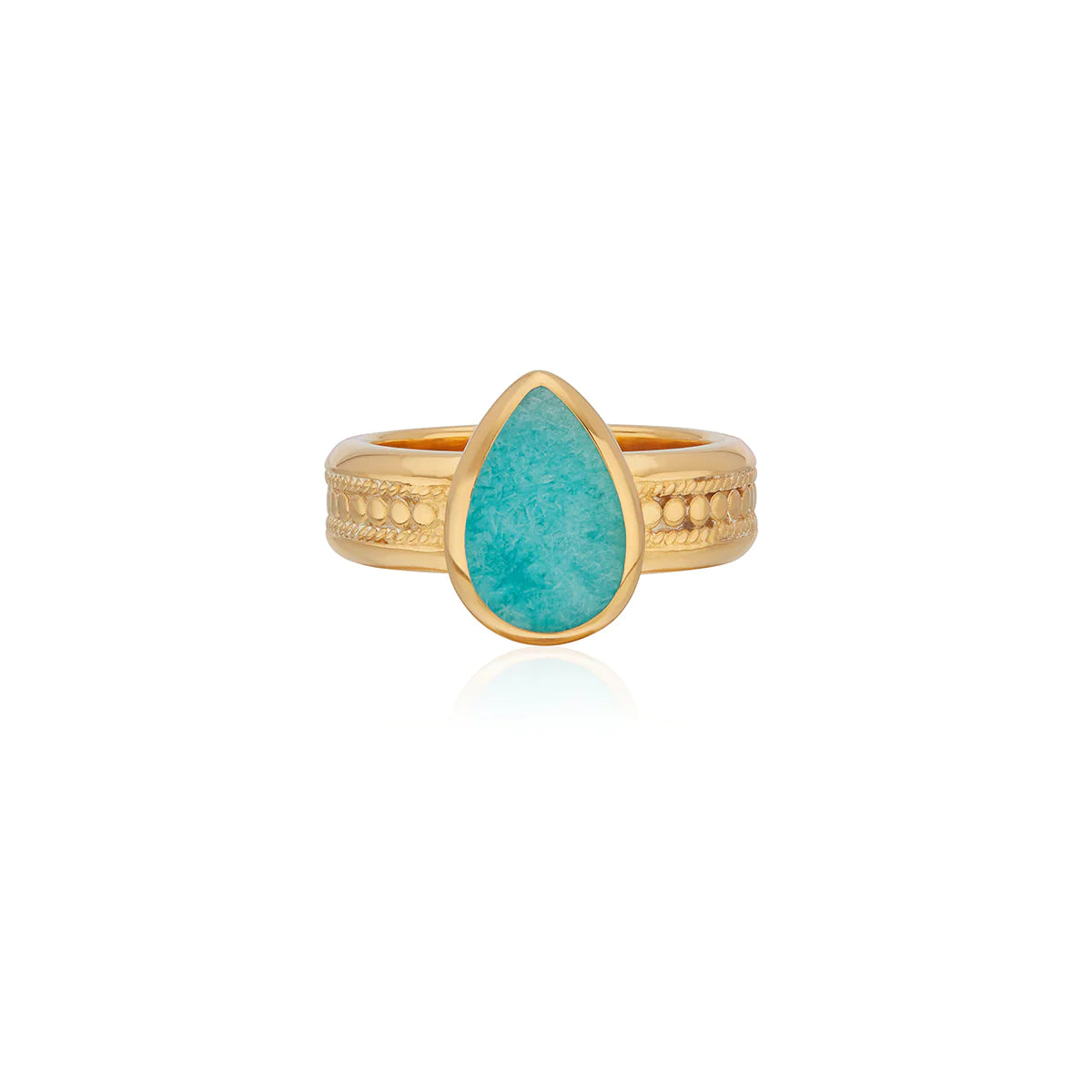 Gold and amazonite cocktail ring with a teardrop stone and gold dotted details on the band