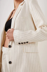 Ivory and navy pinstripe single breasted blazer with two brown button fastening and light shoulder pads