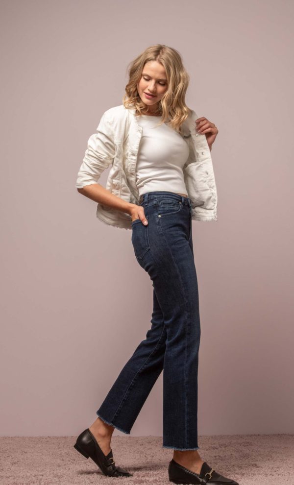 high waisted blue straight leg ankle jeans with raw hem side view