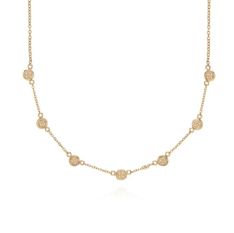 Short necklace with gold discs