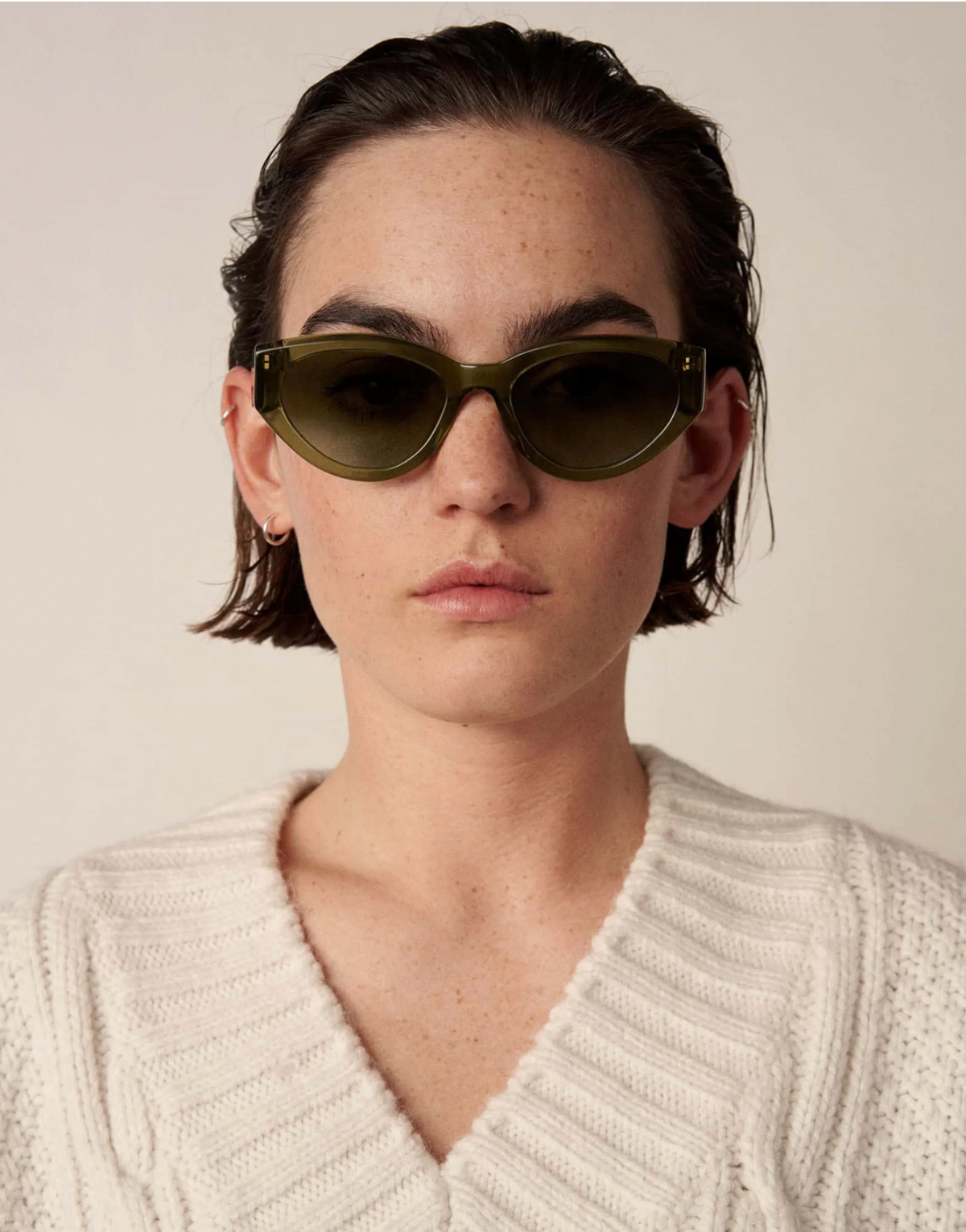 Green acetate cat eye sunglasses on model
