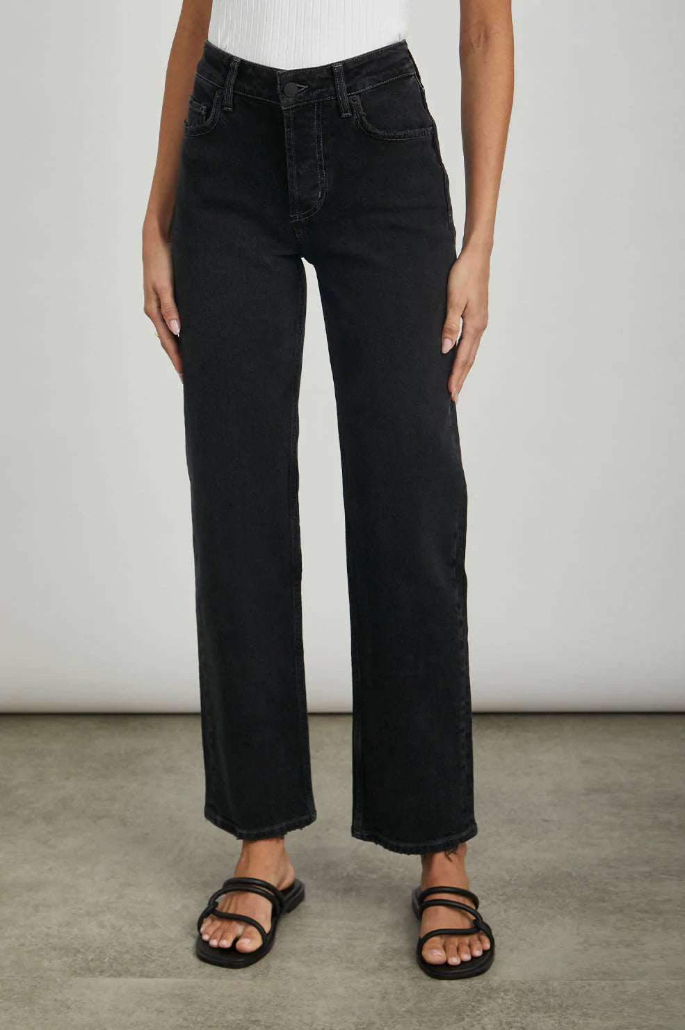 Washed black straight leg jeans with button fly