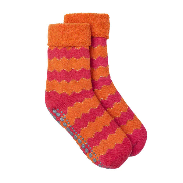 Orange slipper socks with pink zigzag pattern