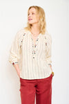 Embroidered blouse with long sleeves and a stripe detail
