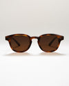Tortoiseshell round sunglasses with a brown lense