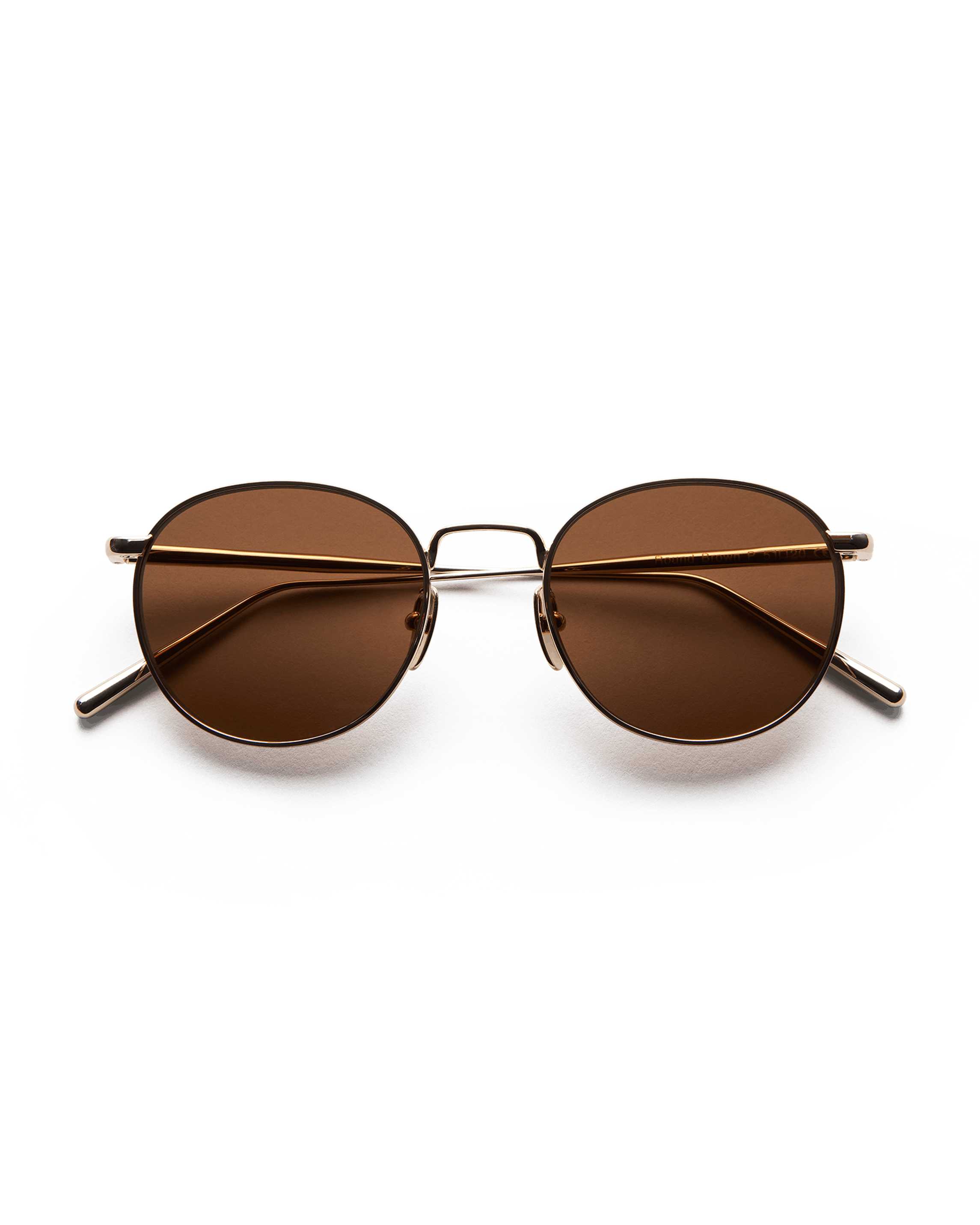Round gold coloured sunglasses with brown lenses