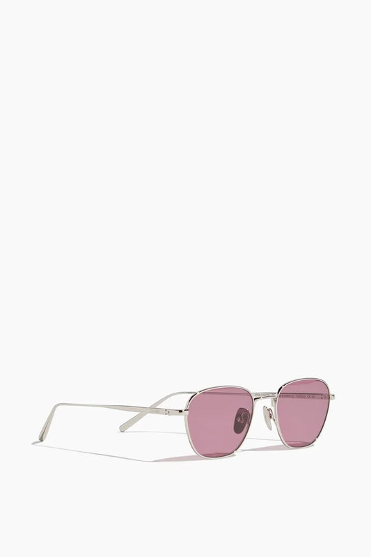 Silver framed sunglasses with red lense