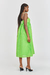 Acid green midi dress with spagetti straps a fitted bust and full empire line skirt with small tassles all over the fabric